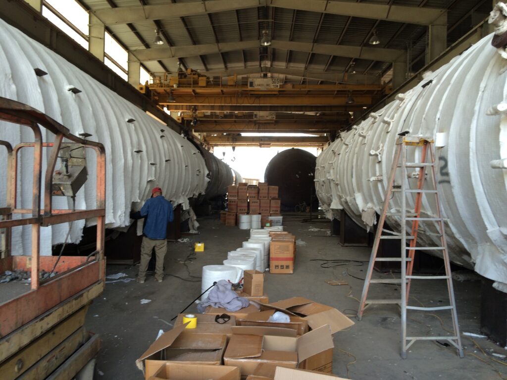 Gulf Coast Combustion crew wrapping pressure vessels in insulation for on-site PWHT Houston Texas