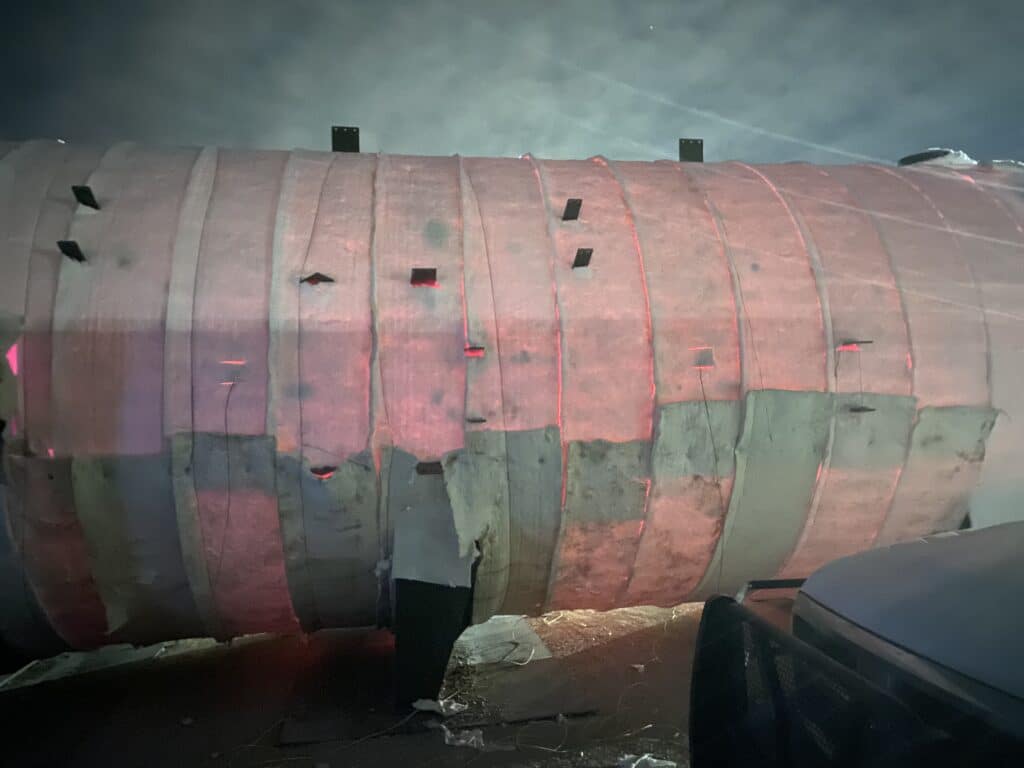 Pressure vessel PWHT at night — glowing insulation wrap during direct gas fire heat treating cycle, Gulf Coast Combustion, on-site heat treating vs furnace